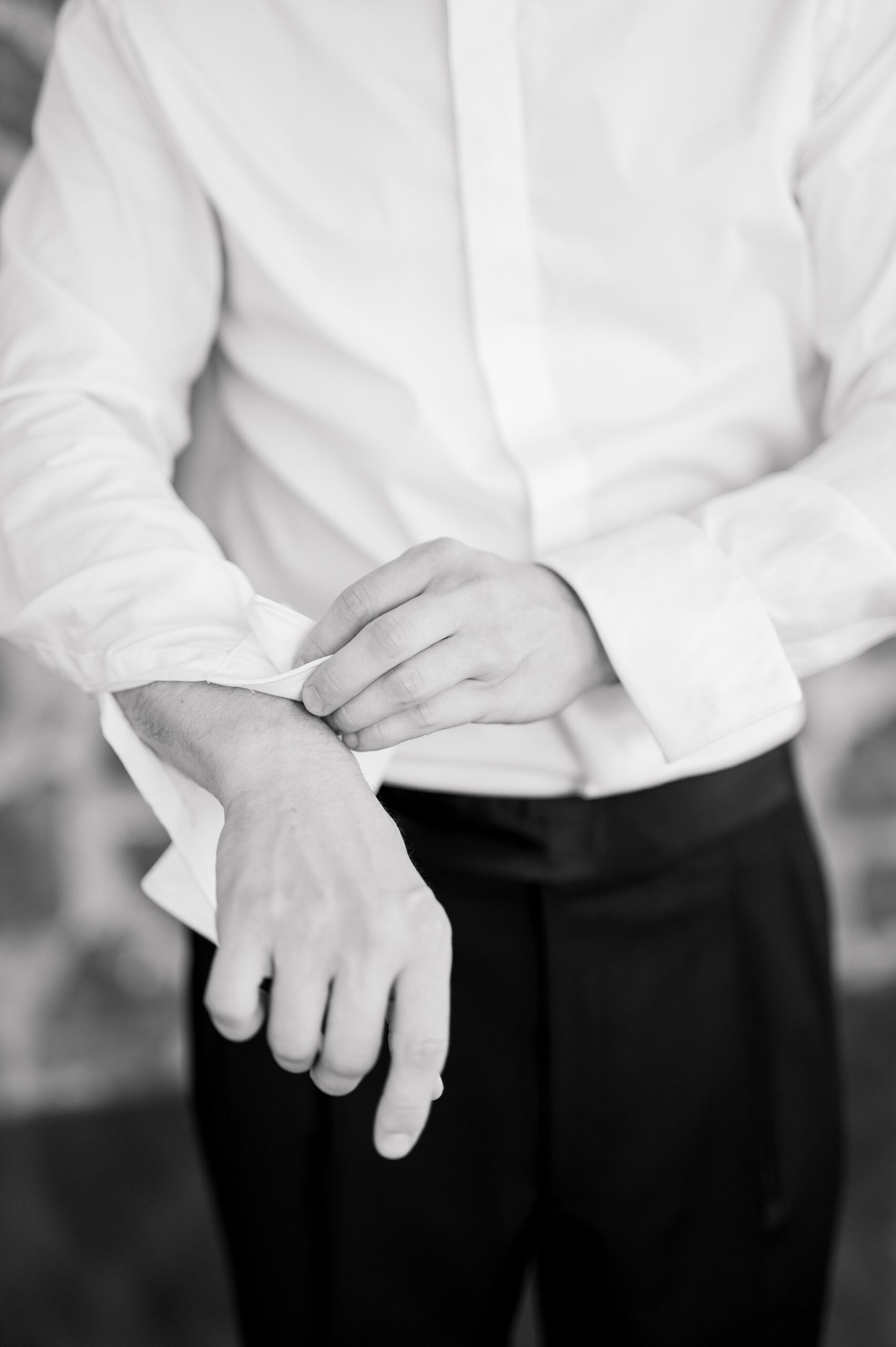 Groom getting ready at Poplar Springs Manor in Warrenton, Virginia photographed by Baltimore Wedding Photographer Cait Kramer