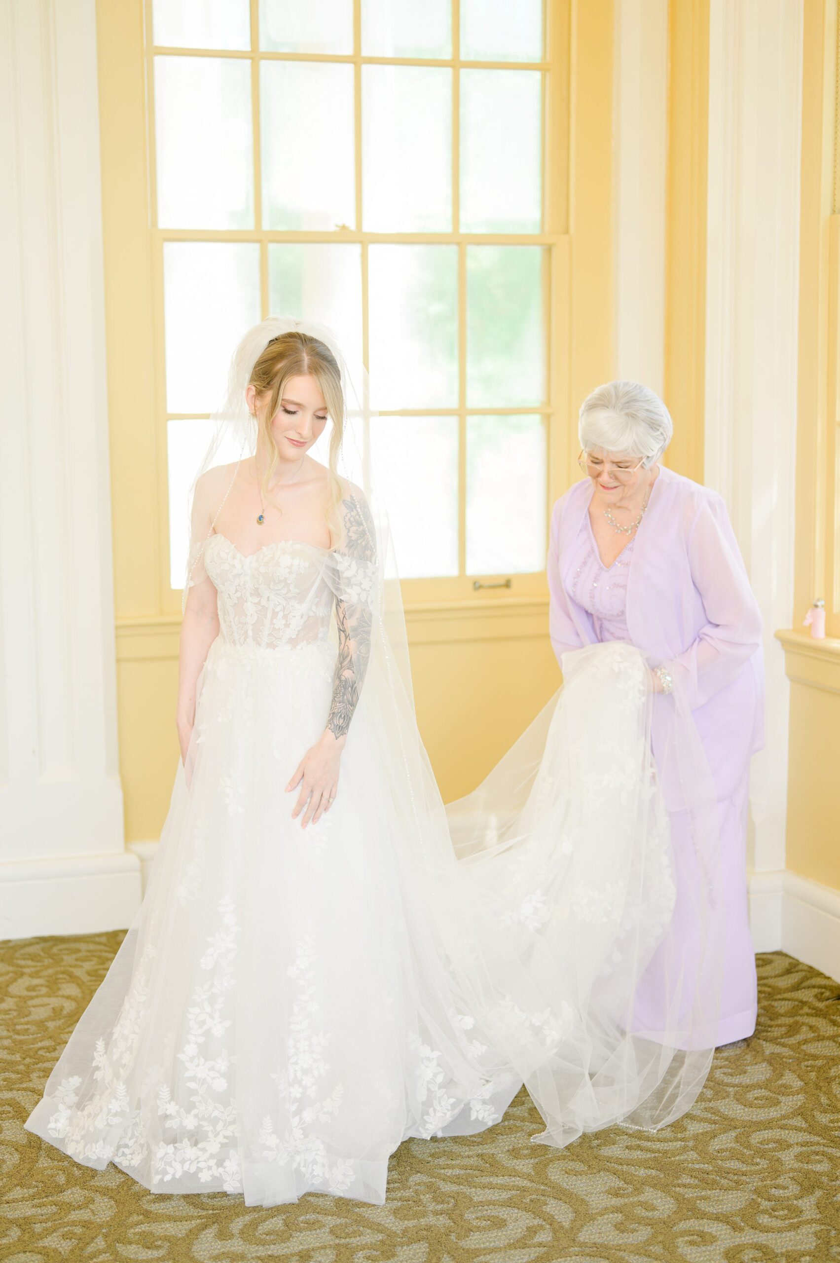 Bride getting ready at Maryland Zoo Wedding in Baltimore, Maryland photographed by Baltimore Wedding Photographer Cait Kramer