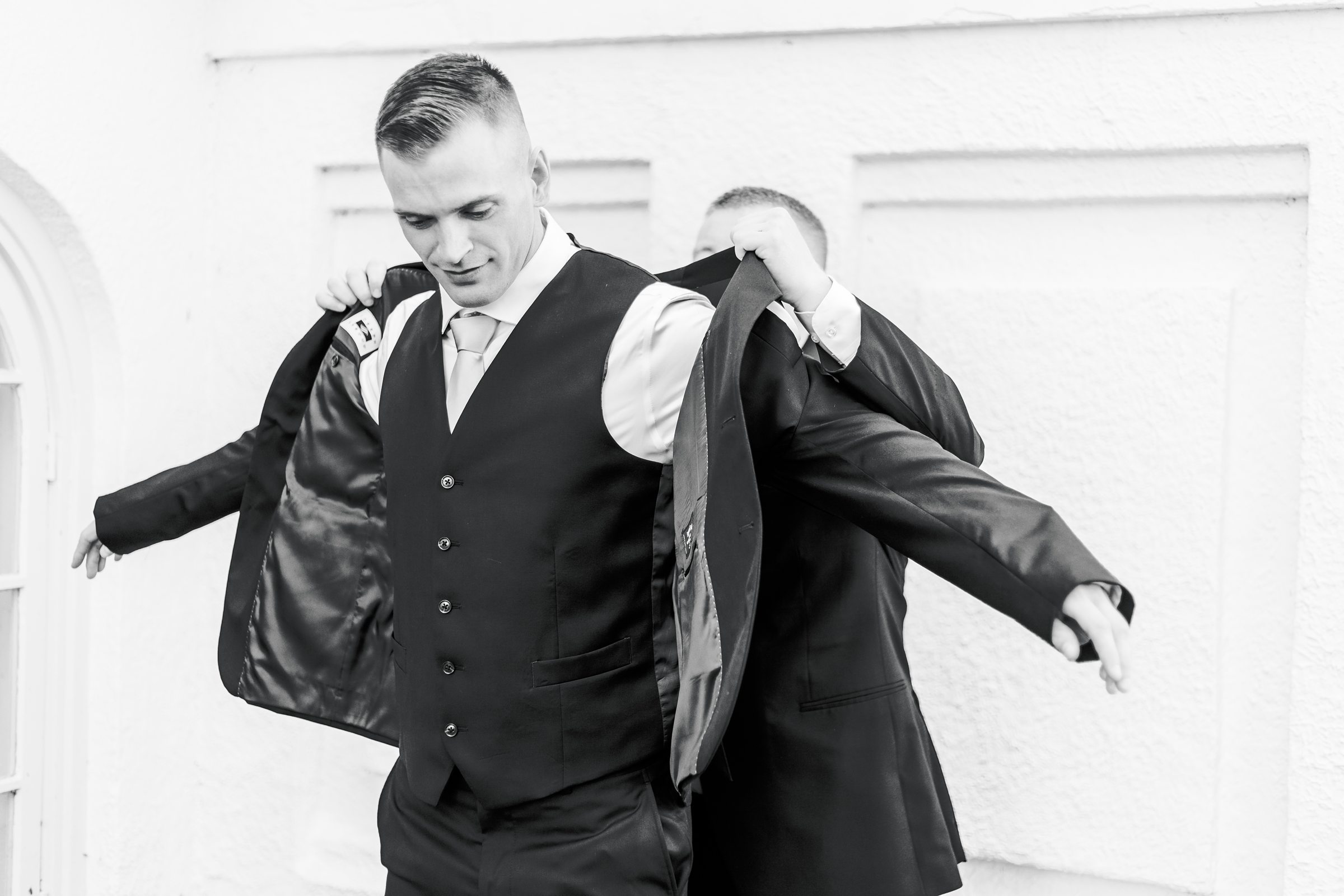 Groom getting ready at Maryland Zoo Wedding in Baltimore, Maryland photographed by Baltimore Wedding Photographer Cait Kramer