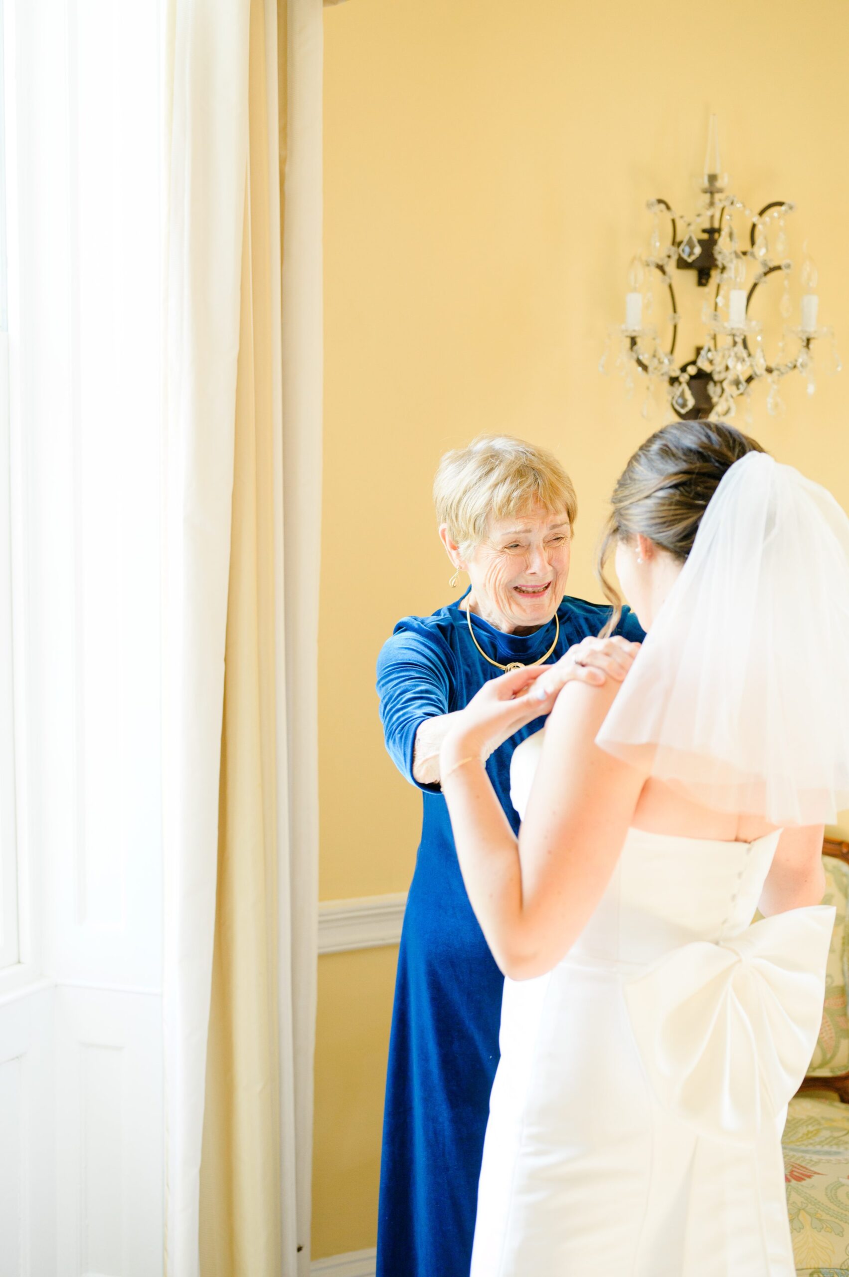 Bride getting ready at Belmont Manor Wedding in Elkridge, Maryland photographed by Baltimore Wedding Photographer Cait Kramer