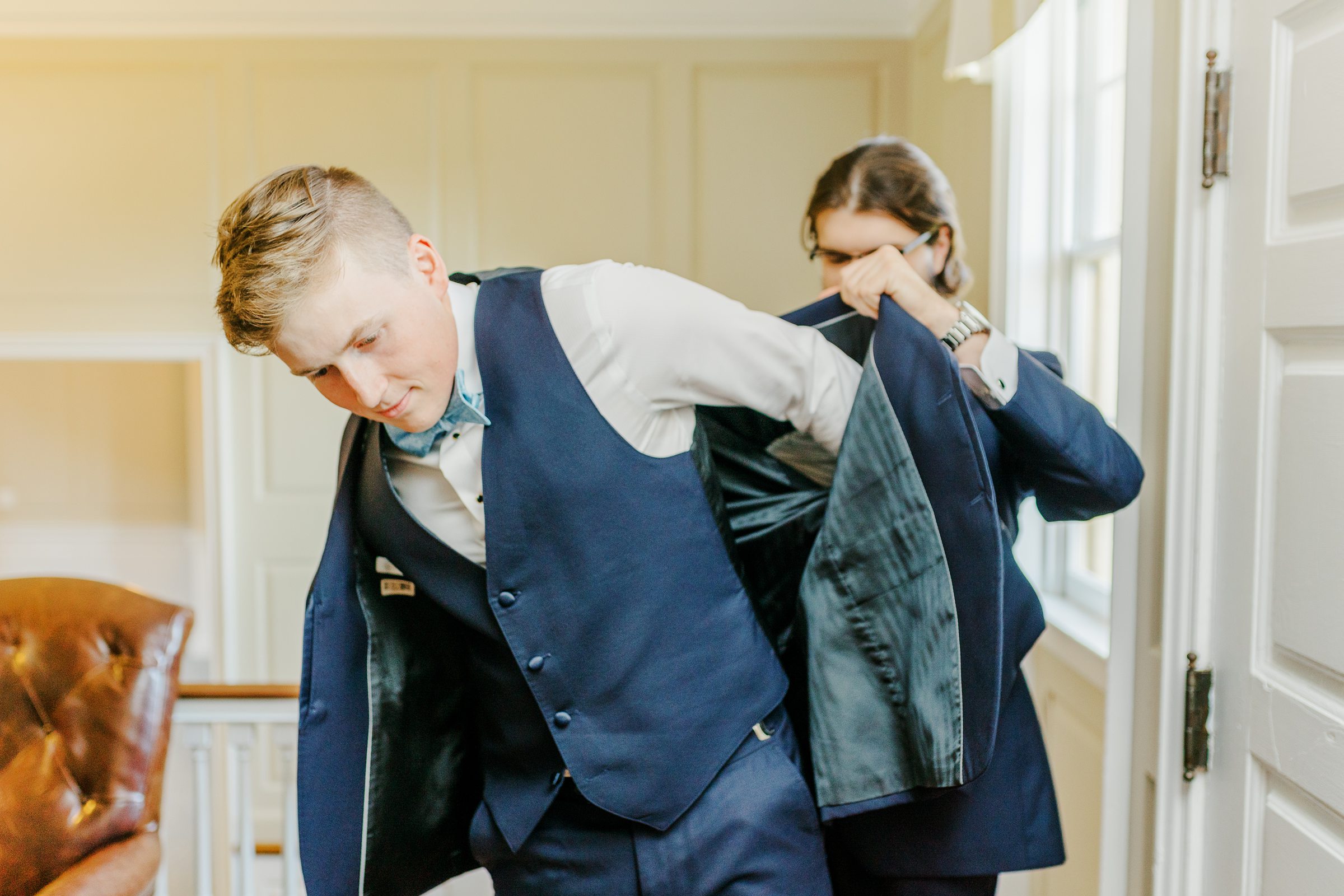 Groom getting ready at Belmont Manor Wedding in Elkridge, Maryland photographed by Baltimore Wedding Photographer Cait Kramer